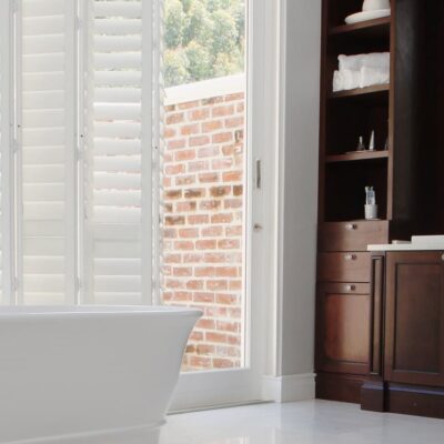 Norman Woodlore Plus Shutters Installed In A Modern And Simple Bathroom.